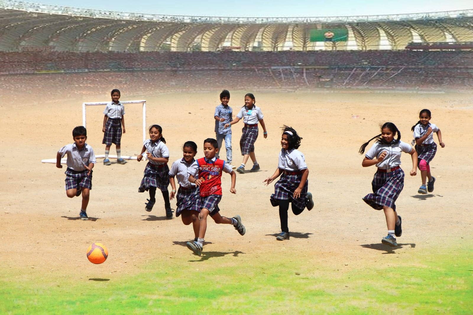 Students playing football joy at Sri Sharada International School